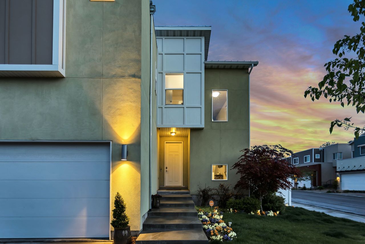 A house in the evening with outdoor security lights on